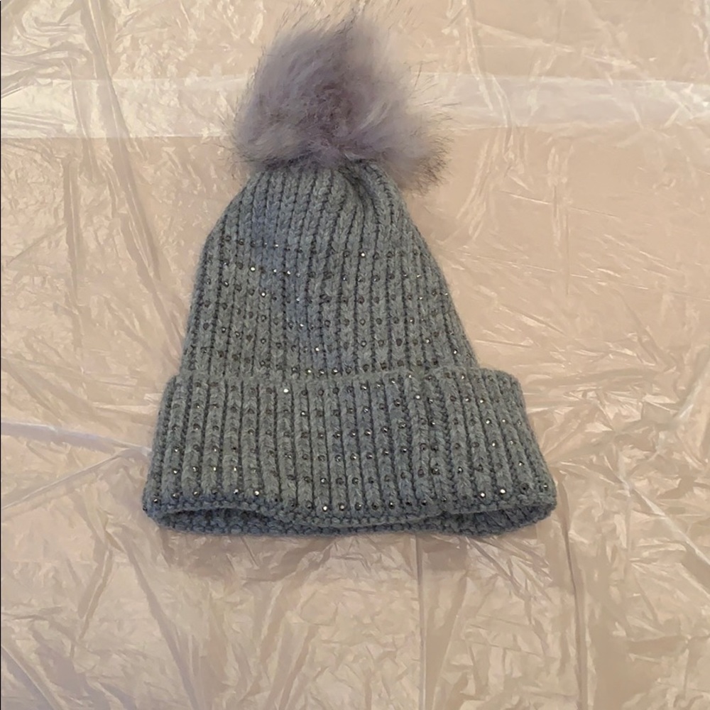 Hat with crystals and puff ball